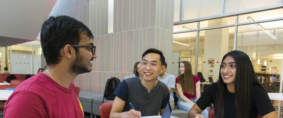 IFTEST students around a table