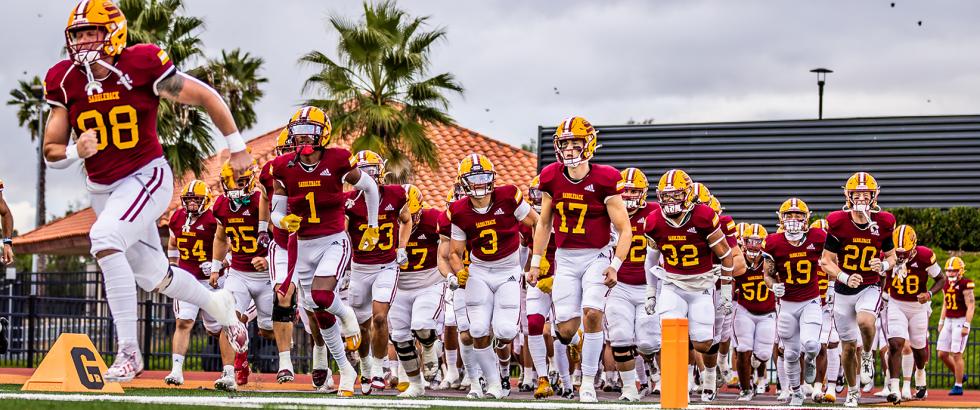 Saddleback Football Players Running onto field before the game