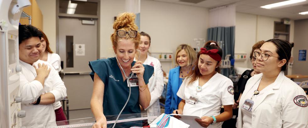 Third semester Saddleback College nursing students practicing their skills in our skills lab.