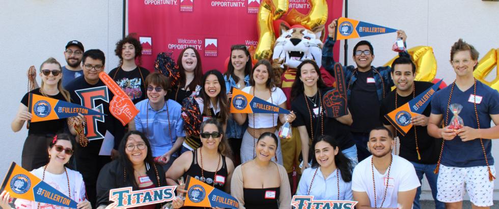 A group of Saddleback College students transferring to CSUF pose together for a photo
