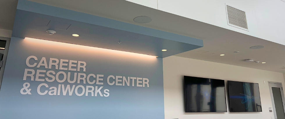 photo of a wall with the words Career Resource Center & CalWorks