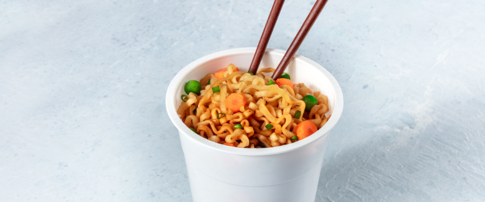 ramen cup. instant noodles with chopsticks.