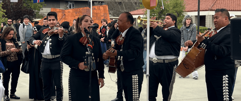 mariachi singing in the quad during a latinx festival event