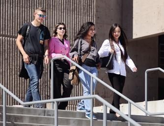 Getting Started - Saddleback College students walking down stairs outside