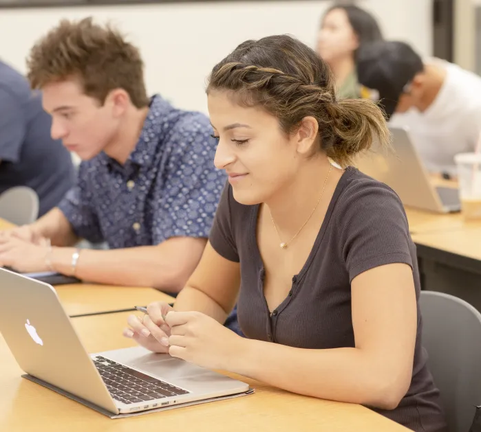 Students in class at laptops