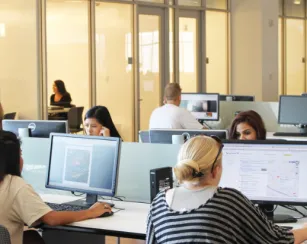photo of students sitting at computers