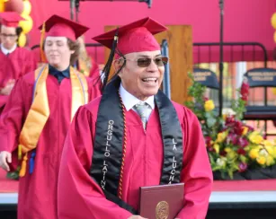 students walking at graduation