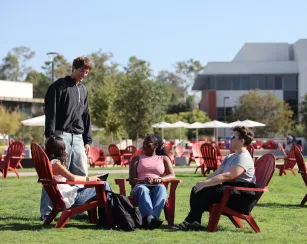 Students in conversation on the quad