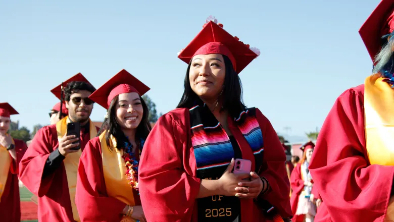 Saddleback Commencement line of students graduating.