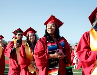 Saddleback Commencement line of students graduating.