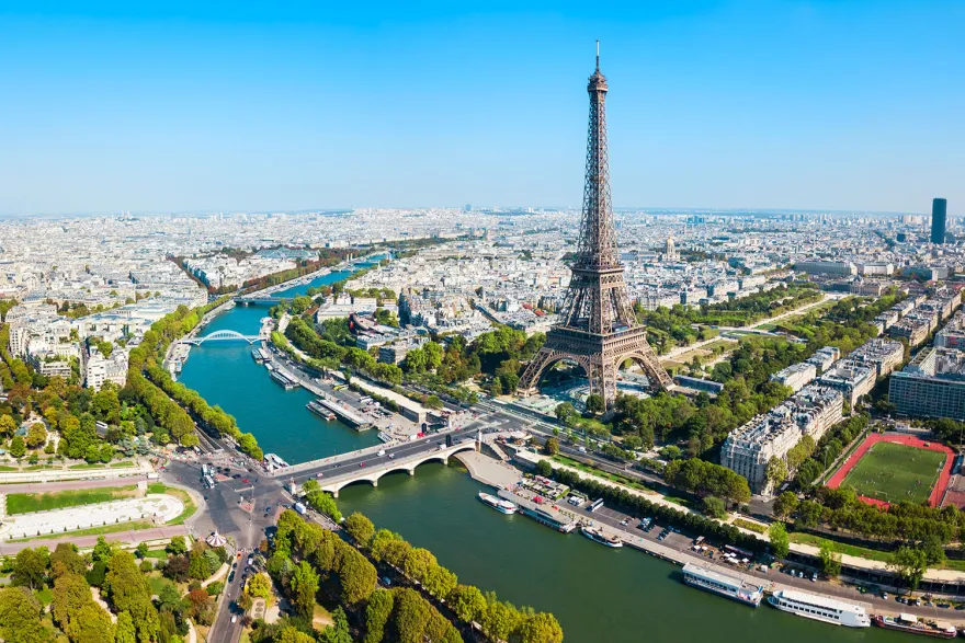 Aerial view of Paris featuring the Eifel Tower.